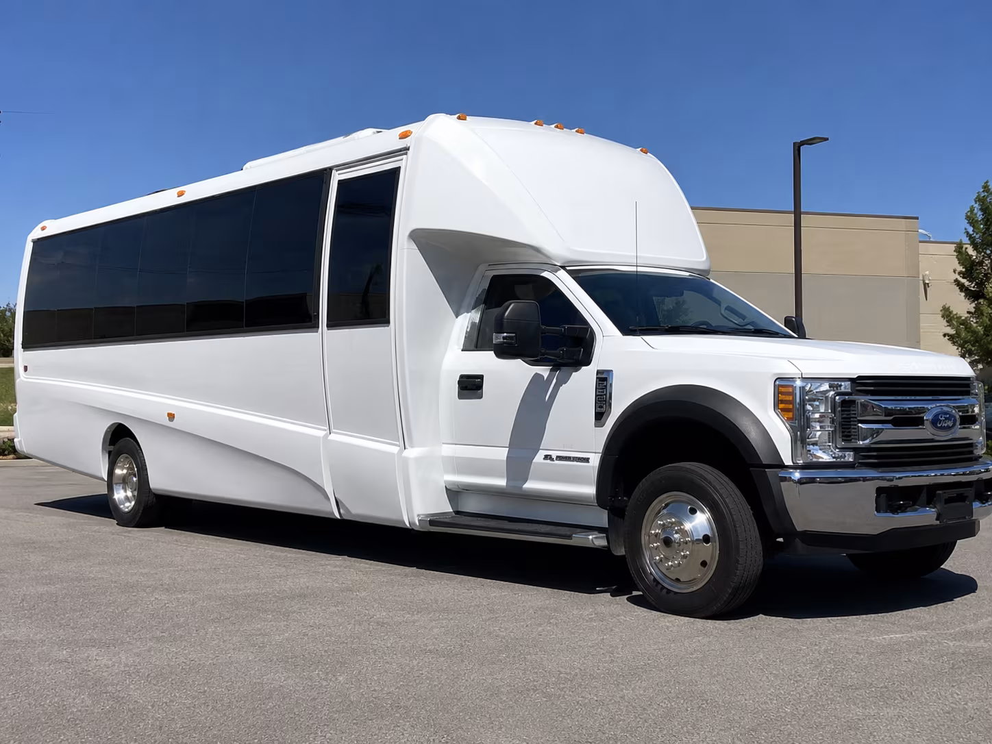 how bus type and group size affect bus rental rates in upland