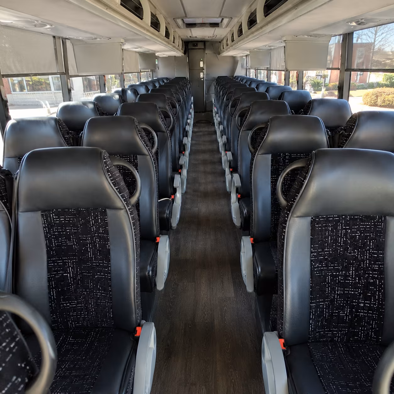upland 54 passenger charter bus inside